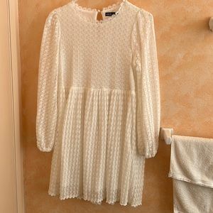 A White Long sleeve above knee length dress